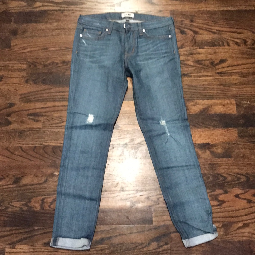 A.N.D. 250 wears Rolled skinny jeans